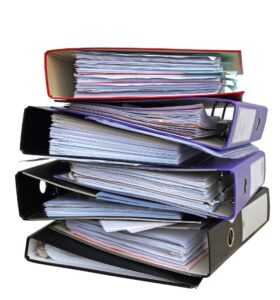 Pile of manual binders