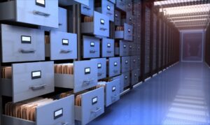 Room with open file cabinets drawers
