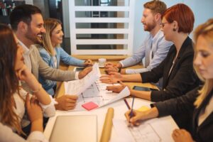 Coworkers attending office meeting