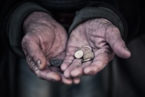 Hands cuffed with change