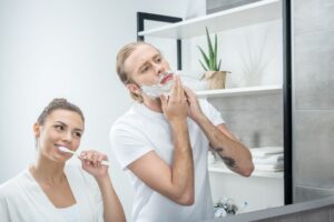 woman and man doing their morning routine