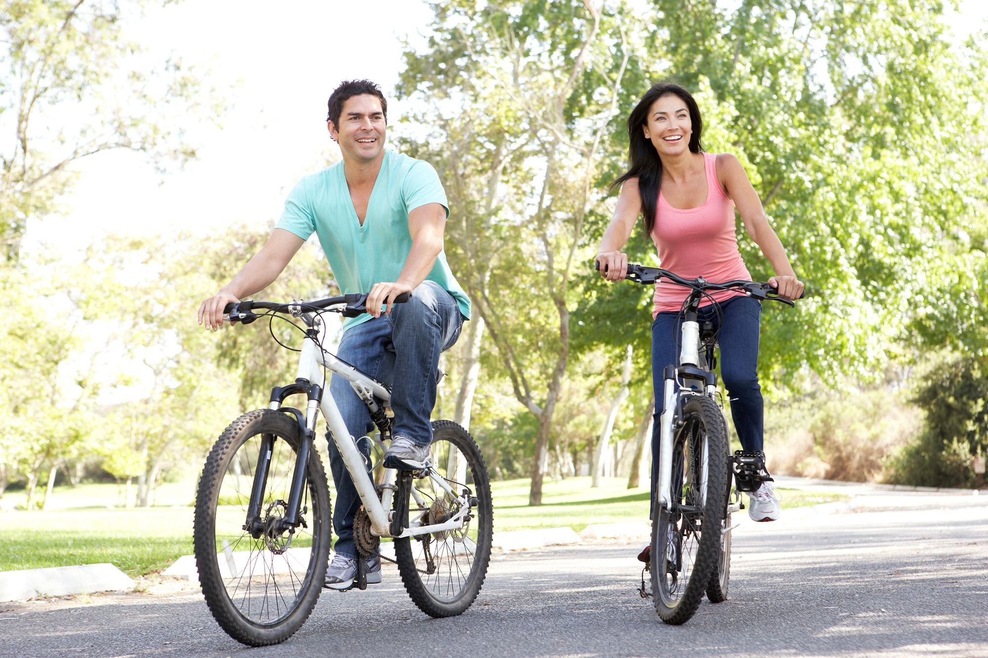 couple riding their bikes together