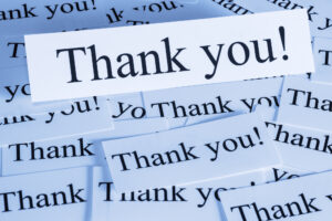 Thank You Concept - a pile of cards with the words thank you.