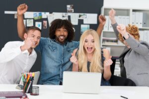 team members celebrating