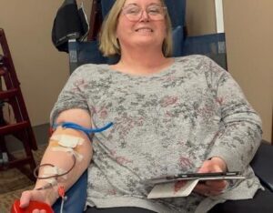 Diane giving blood